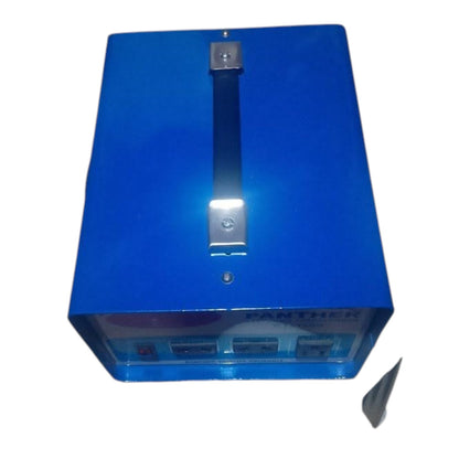 A blue rectangular electronic device with a vertical handle on top, shown against a plain white background with a small black pointed accessory nearby.