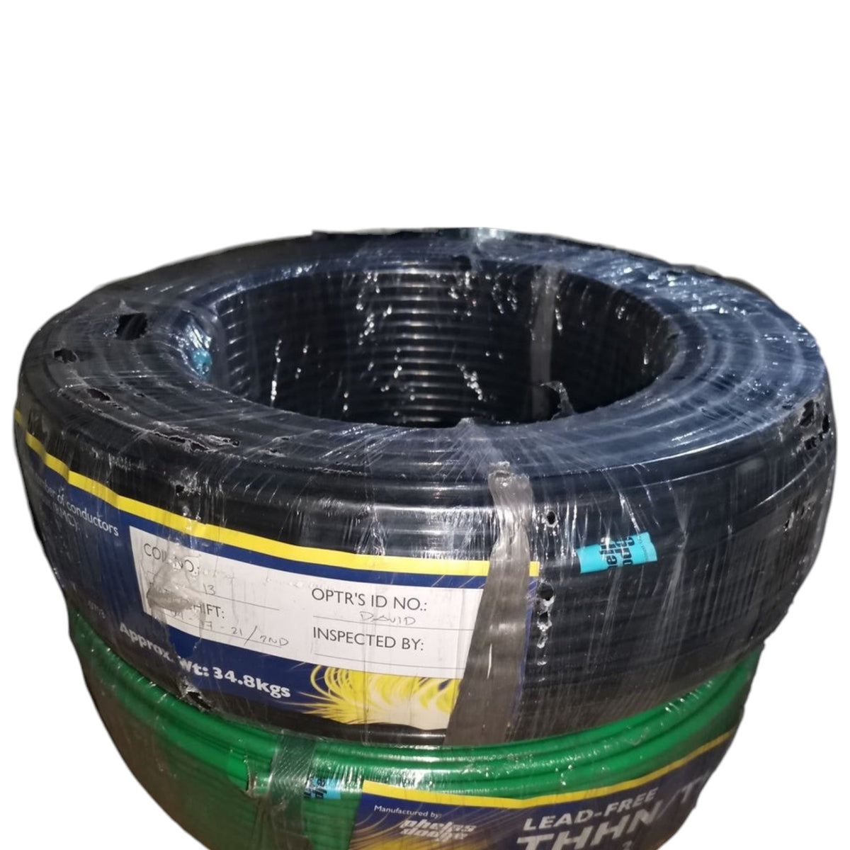 A large spool of black lead-free THWN electrical cable wrapped in clear protective plastic, with a green spool partially visible underneath. A white inspection label is attached to the front.