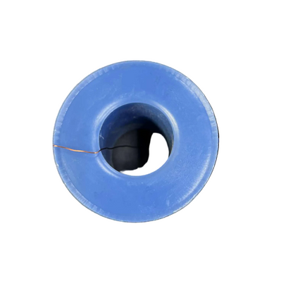 Blue spool of thread on a white background
