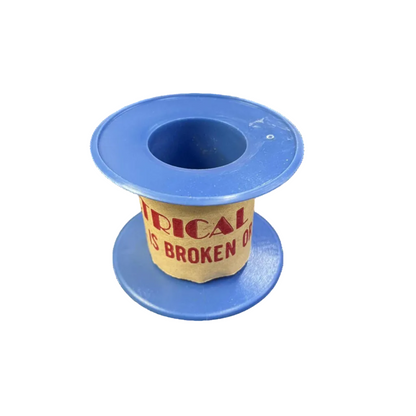 Blue spool with a yellow label on a white background
