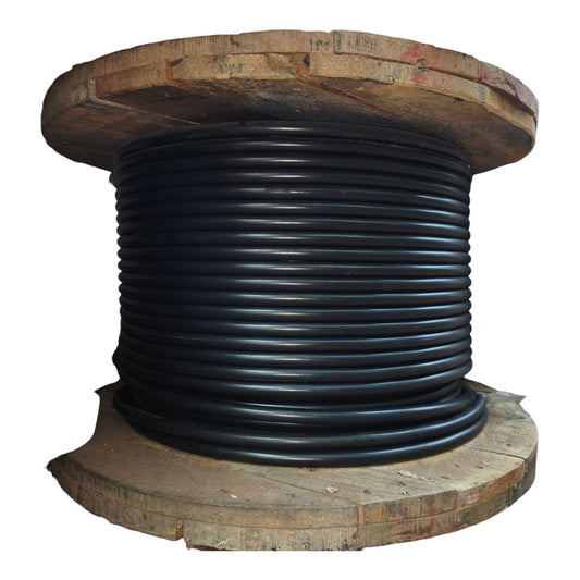 A large spool of thick black cable or wire wound around a rustic wooden spool, isolated on a white background.