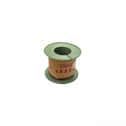Spool of green thread on a white background