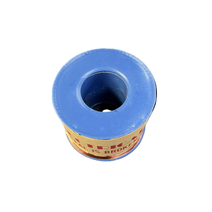 Blue spool of thread with a label on a white background