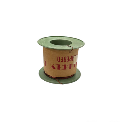 Spool of wire with a cardboard core on a white background