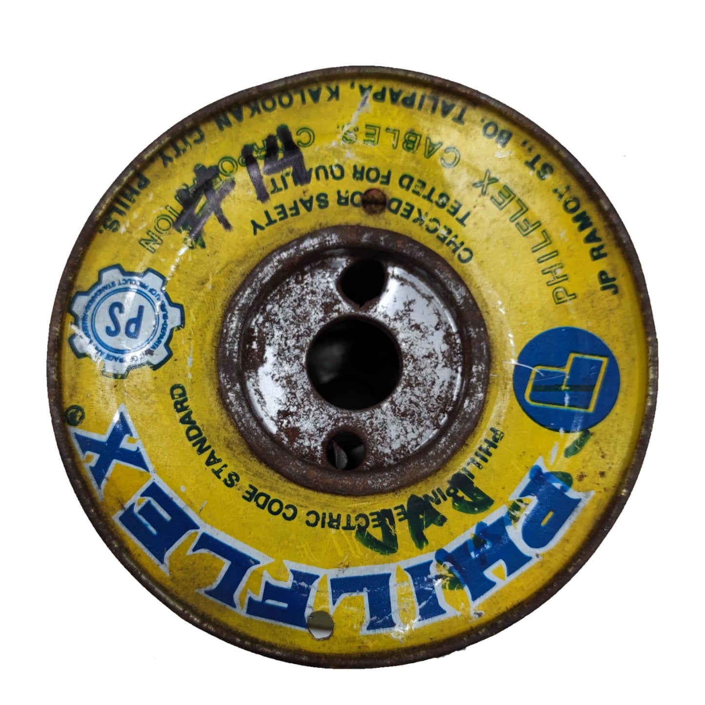A vintage yellow Philillex cable wheel with blue lettering and a central metal hub, shown on a plain white background.
