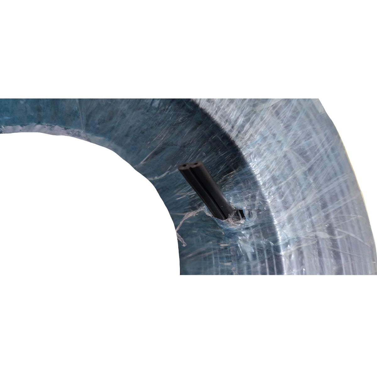 A close-up of a translucent blue-gray curved plastic or acrylic component with a small black rectangular protrusion, isolated on a white background.
