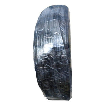 A single black tire wrapped in clear plastic packaging, shown against a plain white background.