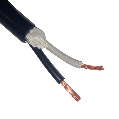 A close-up of a black electrical cable with its outer jacket peeled back to reveal a light gray inner wire and exposed copper-colored strands.