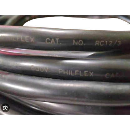 Close-up of coiled black Philflex hydraulic hose with white printed text including 'PHILFLEX', 'CAT.', 'NO.', and 'RC12/3'.