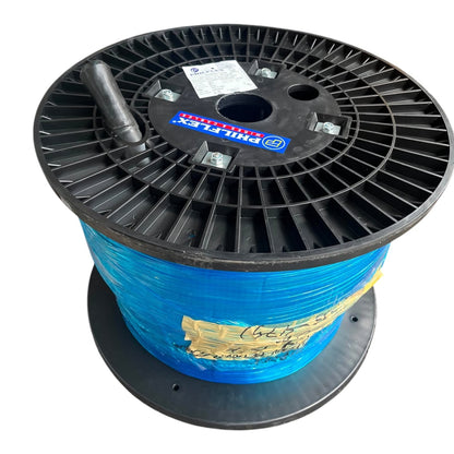 Spool of blue cable with a black reel on a white background