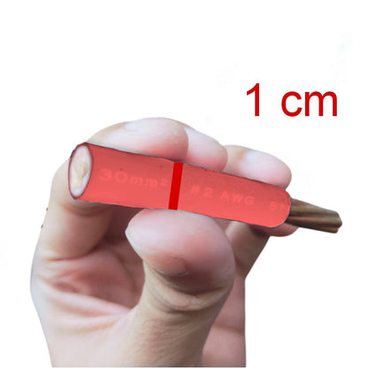 A hand holding a small red insulated wire segment with exposed copper ends, shown against a white background with red text reading '1 cm' and '30mm²' and '#2 AWG'.