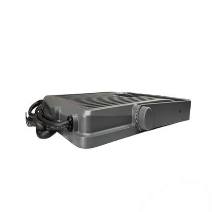 Gray electric grill with power cord on a white background