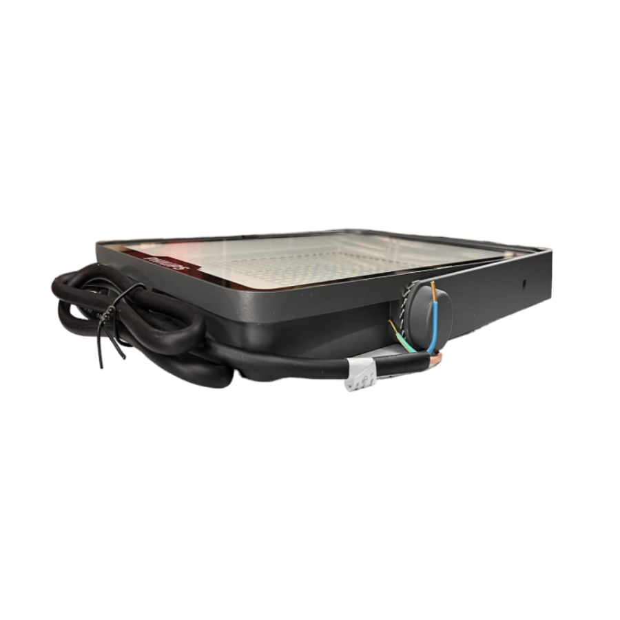 Rectangular electronic device with a screen and cables on a white background