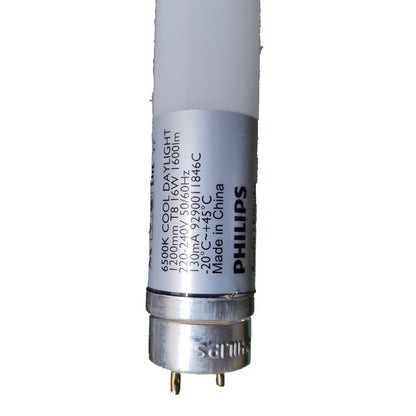 A Philips LED daylight tube light with a silver metal base and gold pins, featuring a white label with black text on a white background.