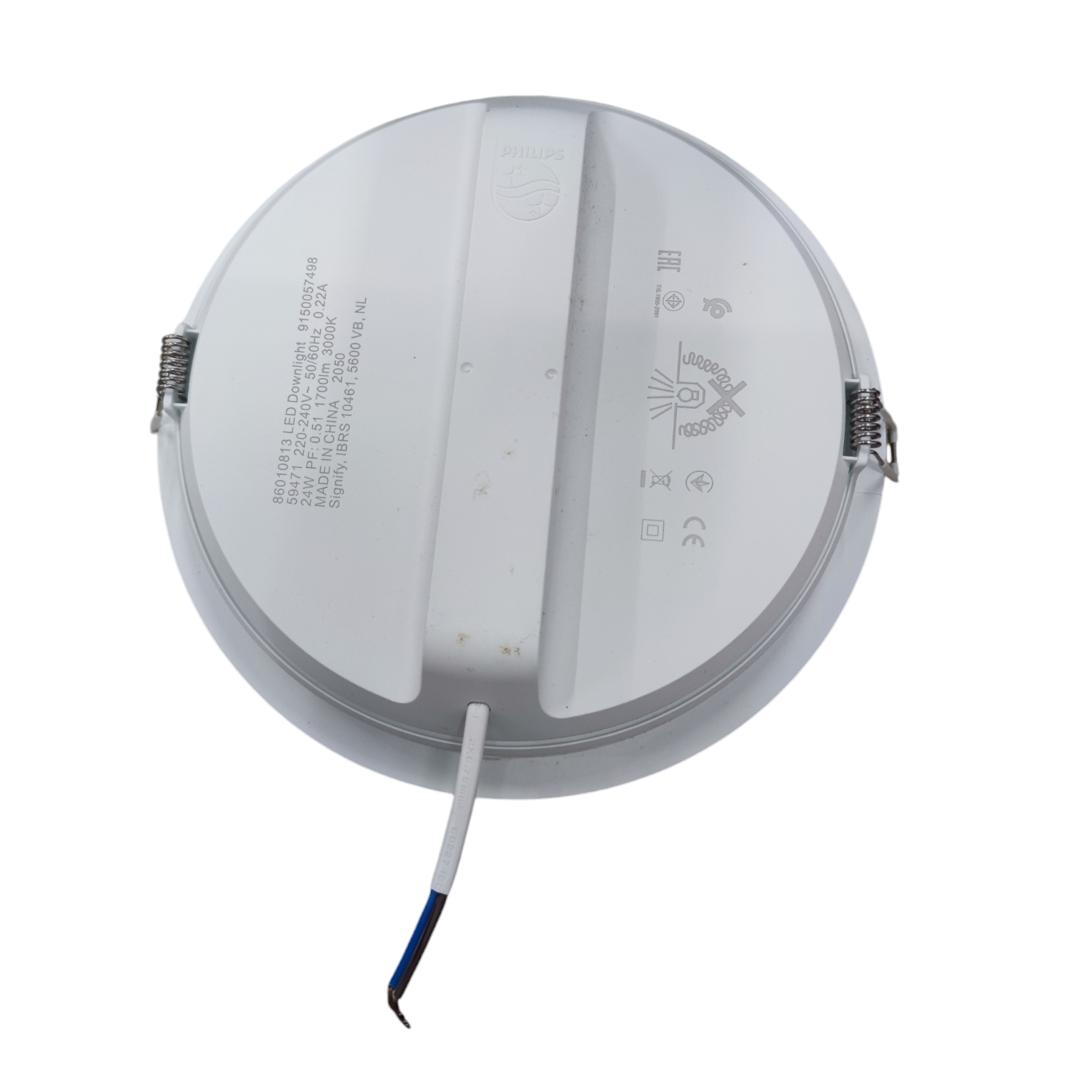 Round white light fixture with visible wiring on a white background