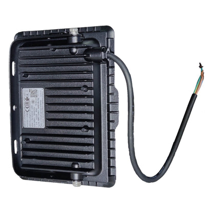 Black electronic device with a cable on a white background