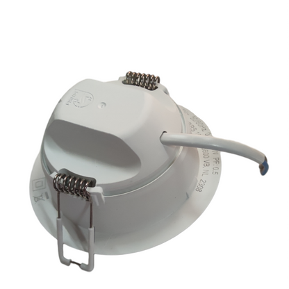 White ceiling light fixture with wiring on a white background