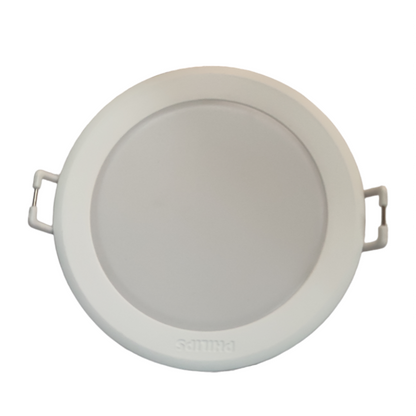 Round white LED downlight on a white background