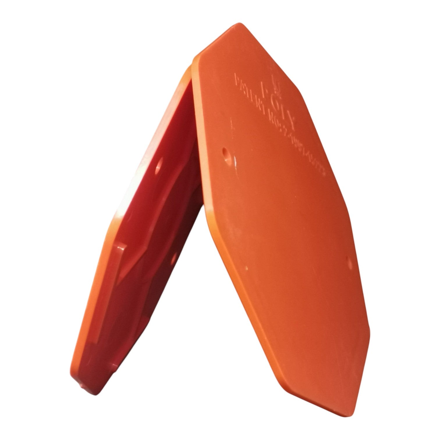 An orange plastic safety barrier block with a hexagonal shape, shown from an angle on a white background.