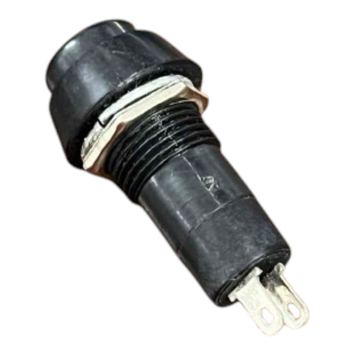 A black plastic electrical push-button switch with a metal terminal and a silver-colored hex nut collar, isolated on a white background.