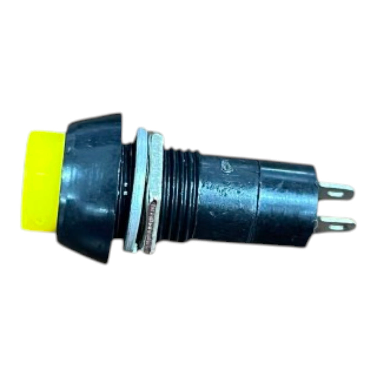 A small industrial push-button switch with a bright yellow button head and a black plastic housing, featuring a silver metal spacer ring and two silver metal pins on the side.
