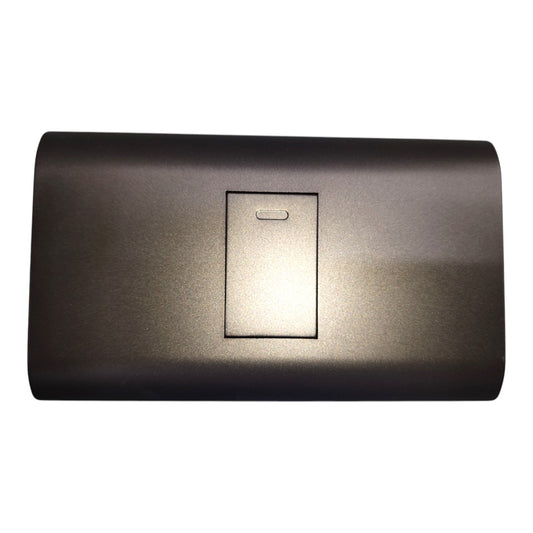 A dark brown brushed metal electronic switch panel with a central rectangular button, isolated on a white background.