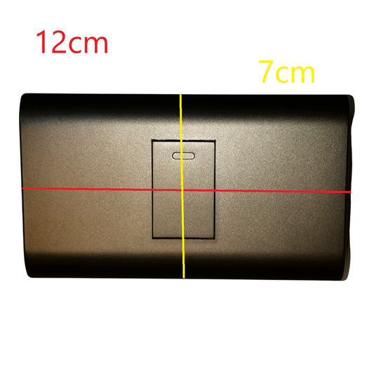 A rectangular metallic wall switch plate shown on a white background with red and yellow measurement overlays indicating 12 cm width and 7 cm height.