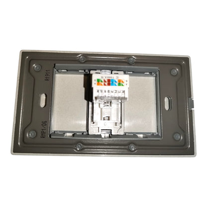 RJ45 network module with colorful wire connectors inside a gray rectangular mounting frame, isolated on a white background.