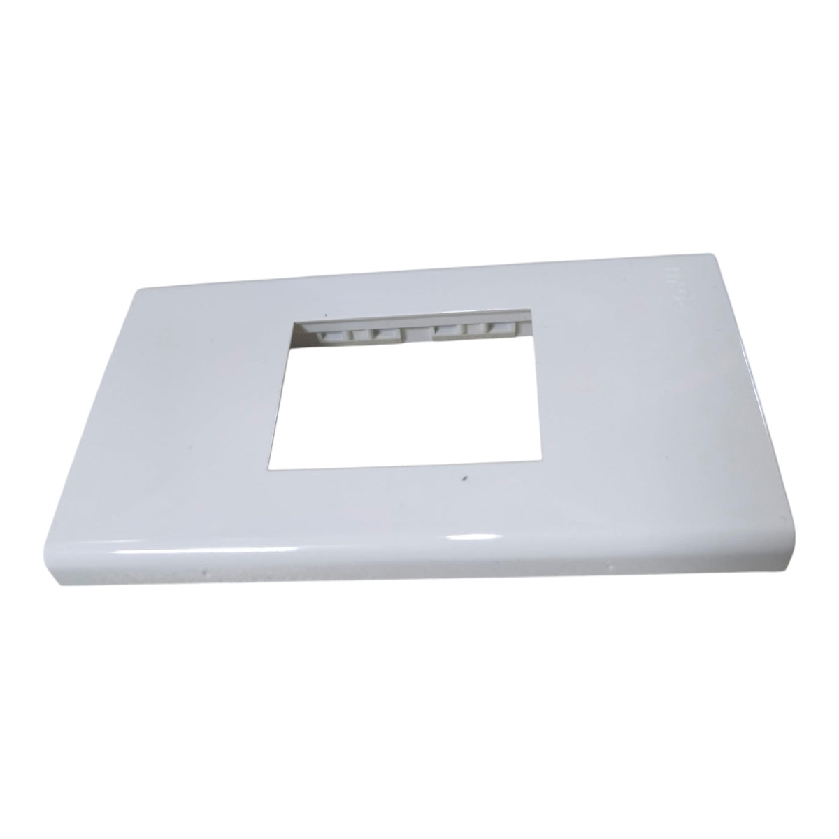 A glossy white rectangular plastic cover plate with a square cutout in the center, shown on a plain white background.
