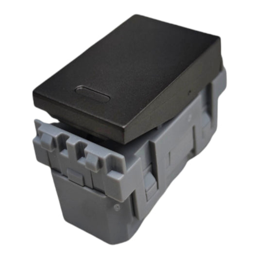 A black rectangular electronic module or cover mounted on a gray plastic housing, shown against a plain white background.