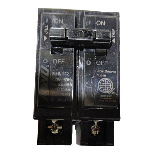 A black plug-in circuit breaker with a central latch, featuring printed specifications and certification logos on its front face, isolated on a white background.