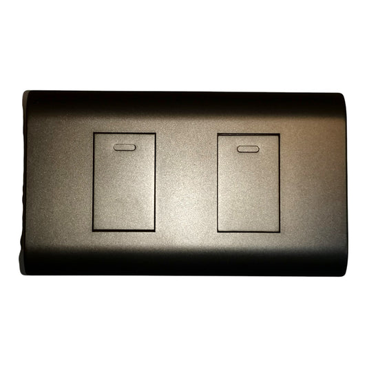 A modern dual switch plate cover in a textured dark metallic finish, featuring two rectangular switch inlays on a rounded rectangular faceplate, isolated on a white background.