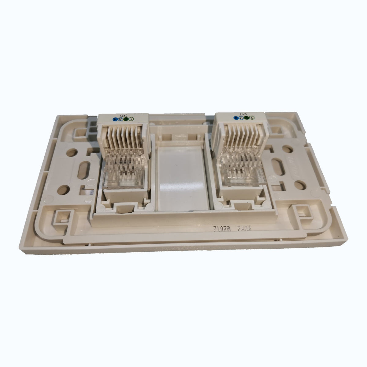 A beige plastic RJ45 8-port network patch panel or modular wall jack, photographed from a top-down angle against a plain white background.