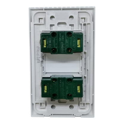 A two-gang modular wall switch plate featuring two green modular terminal blocks with yellow-green screw terminals, set in a white plastic backplate.