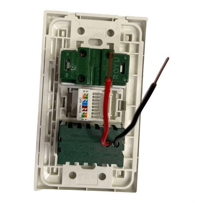 An open white plastic electrical switch socket backplate showing internal components, including green terminal blocks, a RJ45 network module, and red and black wires connected to the terminals.