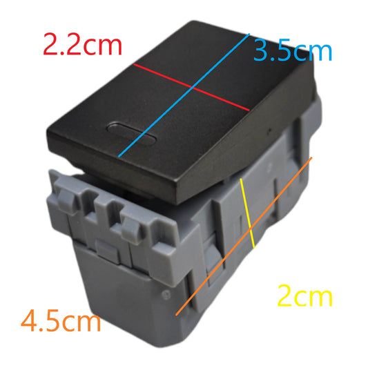 A small black and gray plastic component shown on a white background with overlaid dimension labels in red, blue, orange, and yellow indicating measurements such as 2.2 cm, 3.
