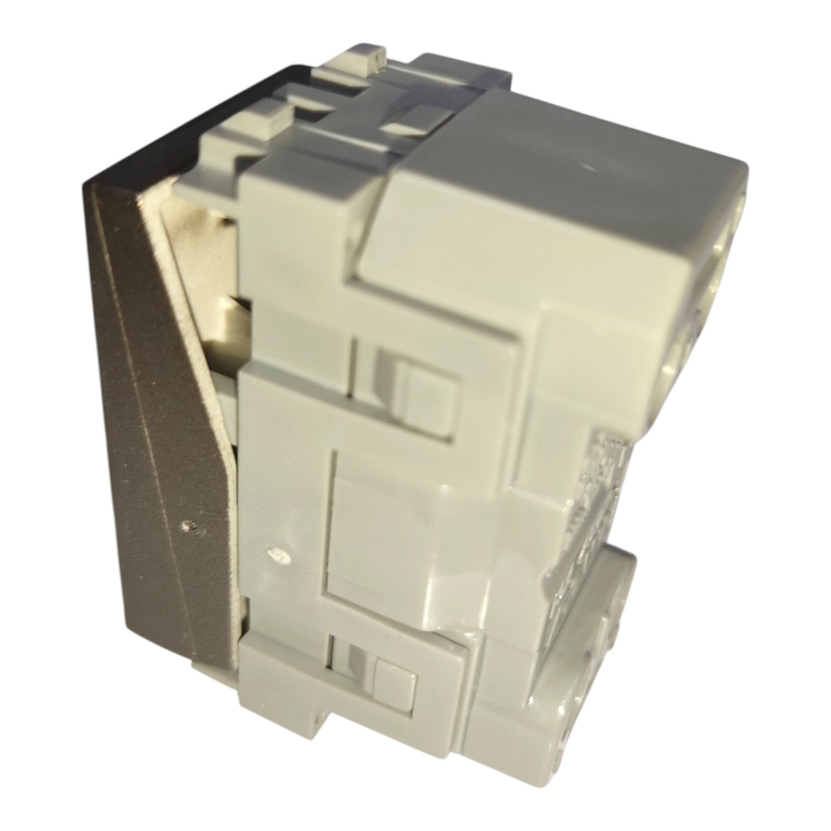 A white plastic electrical connector or terminal block with a dark metallic side panel, shown on a plain white background.