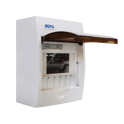 A white electrical distribution board or switch panel with a translucent brown protective cover open to reveal internal wiring and five front switch terminals, branded ROYU on the top front.