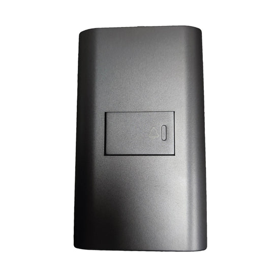A dark gray rectangular replacement battery cover with a recessed power button symbol, shown on a plain white background.