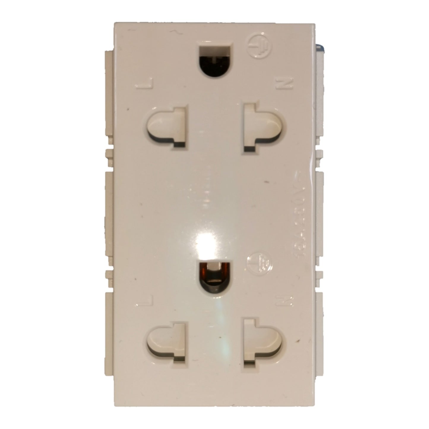 A dual 3-pin UK wall outlet socket module, shown from the rear side. The plastic body is a warm cream/off-white color, and the three-pin plugs are visible at the top and bottom.