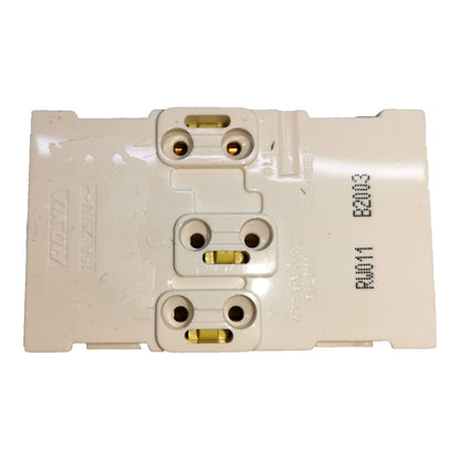 A white plastic multi-outlet power adapter or connector block with three sets of two-pin sockets and printed black markings, shown on a plain white background.