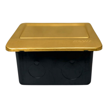 A black plastic utility box with a gold-colored metal lid, featuring two circular openings on the front, shown against a plain white background.