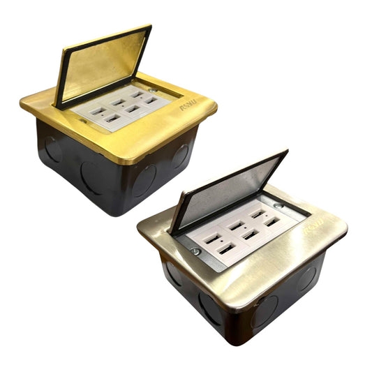 Two industrial electrical outlet boxes shown on a white background, one from a top view and one from a front-three-quarter view. The boxes feature a black plastic housing, a brushed gold metal top cover, and an open silver metal lid revealing multiple electrical outlets.