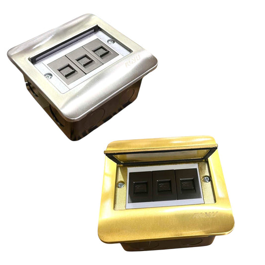 Two waterproof three-way switch outdoor wall boxes shown on a white background, one in brushed silver and one in brushed gold, both with their protective lids open to reveal the black switch buttons.
