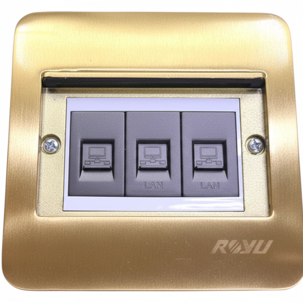 A three-button push-to-talk telephone switch panel with a brushed gold metal faceplate and gray buttons, shown on a white background.