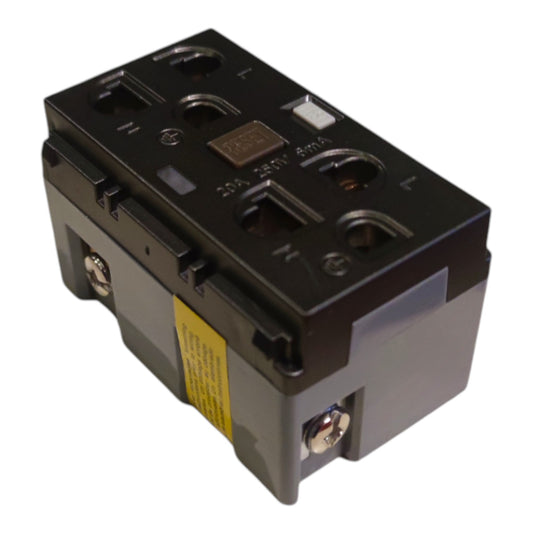 A black and gray electrical circuit breaker with a yellow warning label, photographed on a plain white background.