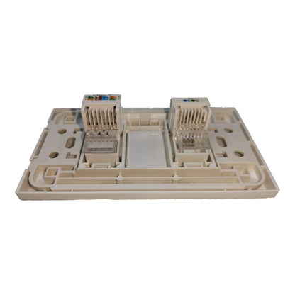 A beige plastic RJ45 network patch panel connector block with two 8-port modular connectors on a plain white background.