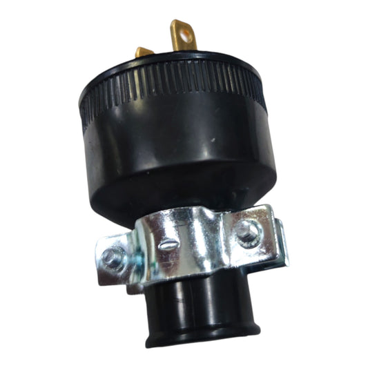 A black plastic electrical outlet adapter with a silver metal clamp and brass-colored pins, isolated on a white background.