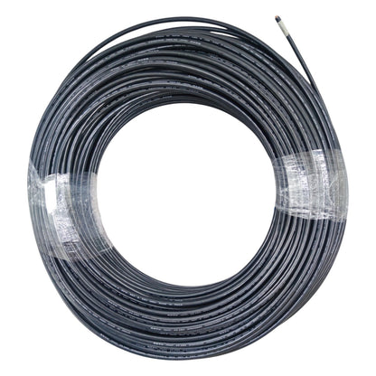 Coiled black cable on a white background
