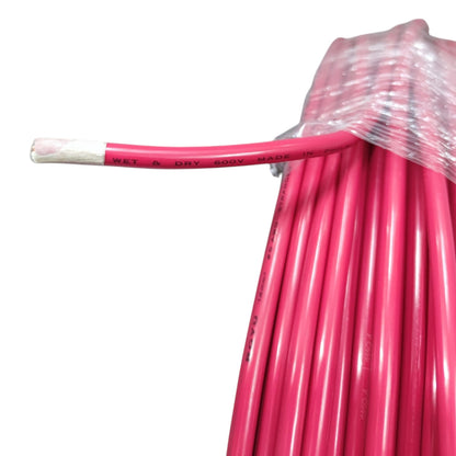 Pink wire with a clear protective cover on a white background